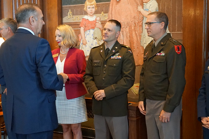 Gov Kehoe awards Challenge Coin to state team members
